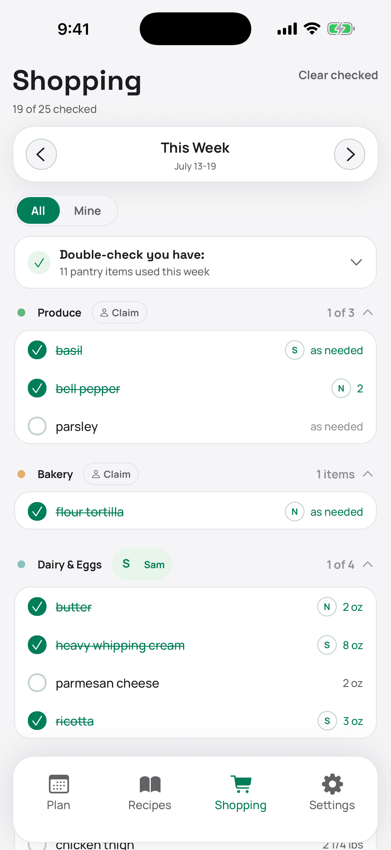 Your partner's phone with the week's shared grocery list, synced live